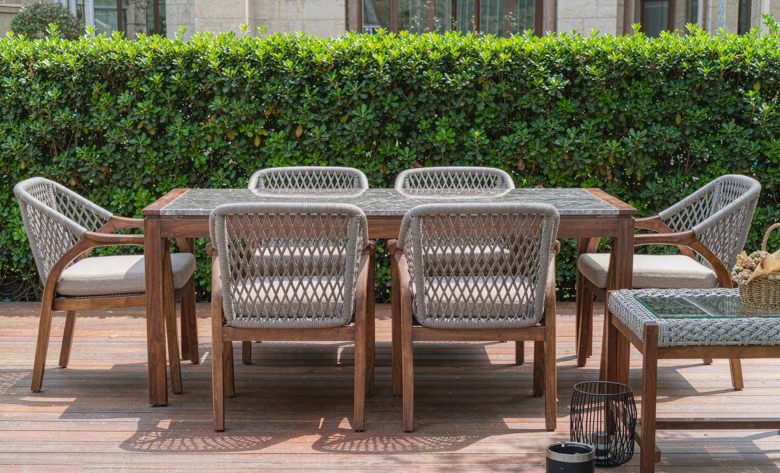 Outdoor patio dining set on a wooden deck